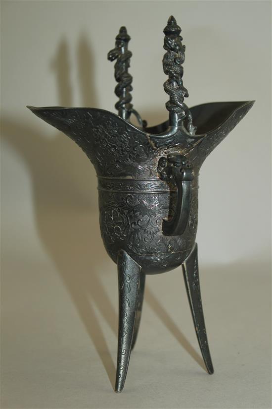 A late 19th century Japanese silver model of a Chinese archaic jue, 11 oz.